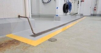 ProKrete SL self-leveling urethane cement floor being installed in a brewery